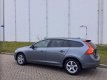 Volvo V60 - 2.0 D3 Momentum | Automaat | Navigatie | PDC voor+achter - 1 - Thumbnail