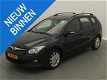 Hyundai i30 CW - 1.6i i-Motion / airco / lmv / zwart-metallic - 1 - Thumbnail