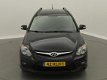 Hyundai i30 CW - 1.6i i-Motion / airco / lmv / zwart-metallic - 1 - Thumbnail