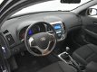 Hyundai i30 CW - 1.6i i-Motion / airco / lmv / zwart-metallic - 1 - Thumbnail