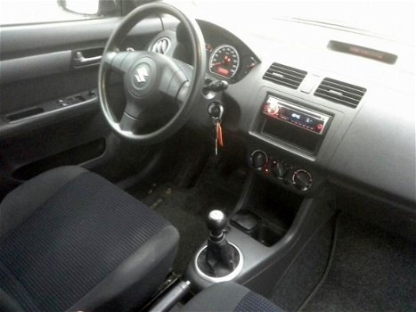 Suzuki Swift - 1.3 Comfort Cool - 1