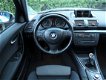 BMW 1-serie - 116i Executive | 18'' Velgen | Navigatie | Schuif/kantel dak | Nieuwe apk - 1 - Thumbnail