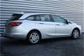 Opel Astra Sports Tourer - 1.0 TURBO 105PK ONLINE EDITION / NAVI / AIRCO / LED / PDC / TREKHAAK / BL - 1 - Thumbnail