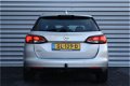 Opel Astra Sports Tourer - 1.0 TURBO 105PK ONLINE EDITION / NAVI / AIRCO / LED / PDC / TREKHAAK / BL - 1 - Thumbnail