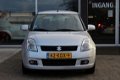 Suzuki Swift - 1.3 Exclusive Automaat | Airco | Bovag Garantie 6 maanden | Rijklaarprijs | Onderhoud - 1 - Thumbnail