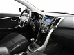 Hyundai i30 Wagon - 1.6 GDI 135 PK NW MODEL i-MOTION + AIRCO / CRUISE / PDC / LMV - 1 - Thumbnail