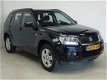 Suzuki Grand Vitara - 2.0-16V Exclusive 4x4 - 1 - Thumbnail