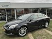 Toyota Avensis - 1.8 VVT-i 147pk Business Plus | AUTOMAAT, Navi, Cruise, dealeronderhouden - 1 - Thumbnail