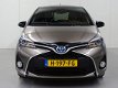Toyota Yaris - 1.5 Hybrid Dynamic Bi-Tone | Navigatie | Safety Sense - 1 - Thumbnail