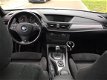 BMW X1 - E84 2.0i AUT-f1/PAN/NAVI/XDRIVE/MPAKK - 1 - Thumbnail