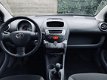 Toyota Aygo - AIRCO - 5DRS - EL PAKKET - NIEUWSTAAT - APK - 1 - Thumbnail