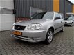 Hyundai Accent - 1.3i Active Young Airco Nette auto - 1 - Thumbnail