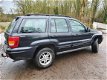 Jeep Grand Cherokee - 4.0i Limited /AIRCO/ LEDER/ AUTOMAAT/ YOUNG TIMER - 1 - Thumbnail