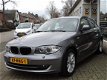 BMW 1-serie - 118i Business Line Ultimate Edition Automaat - Schuifdak | PDC | Climat/Cruise | Afn. - 1 - Thumbnail