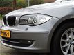 BMW 1-serie - 118i Business Line Ultimate Edition Automaat - Schuifdak | PDC | Climat/Cruise | Afn. - 1 - Thumbnail