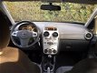 Opel Corsa - 1.4-16V Design Edition 1e eigenaar * NIEUWSTAAT - 1 - Thumbnail