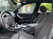 BMW 3-serie - 320i High Executive, automaat, schuifdak - 1 - Thumbnail
