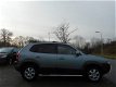 Hyundai Tucson - 2.0i Dynamic AIRCO/CRUISE/BULLBARS/TREKH - 1 - Thumbnail