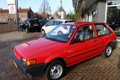 Nissan Sunny - Uniek voor Liefhebber 1.3 L - 1 - Thumbnail