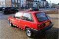 Nissan Sunny - Uniek voor Liefhebber 1.3 L - 1 - Thumbnail