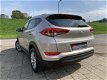 Hyundai Tucson - 1.6 Comfort Navigatie Camera Leer Pdc Keyless - 1 - Thumbnail