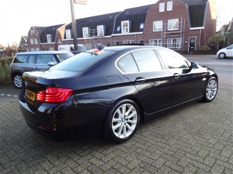 BMW 5-serie - 520d Aut 190pk High Executive Leer Schuifdak Navigatie - 1