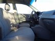 Hyundai Tucson - 2.0i Active | 133.000 km | Airco nu € 3.975, - 1 - Thumbnail