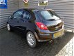 Opel Corsa - 1.4-16V Sport - 1 - Thumbnail