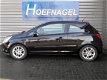 Opel Corsa - 1.4-16V Sport - 1 - Thumbnail