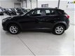 Mazda CX-3 - 2.0 SkyActiv-G 120 TS ECC / LMV / CAMERA / KEYLES - 1 - Thumbnail