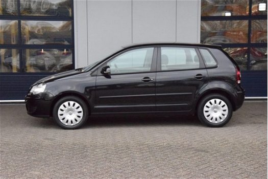 Volkswagen Polo - 1.2-12V Comfortline airco cruise PDC - 1