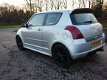 Suzuki Swift - 1.5 Exclusive sport - 1 - Thumbnail