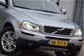 Volvo XC90 - 2.4 D5 Summum 5p. / Navigatie / Leer / Memory Seats / Xenon / PDC / VOL / Nette Auto / - 1 - Thumbnail