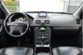 Volvo XC90 - 2.4 D5 Summum 5p. / Navigatie / Leer / Memory Seats / Xenon / PDC / VOL / Nette Auto / - 1 - Thumbnail