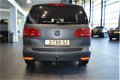 Volkswagen Touran - 1.2 TSI Comfortline BlueMotion 7p. navigatie clima cruise pdc trekhaak - 1 - Thumbnail