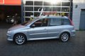 Peugeot 206 SW - 1.6-16V Quiksilver I Airco I Sport velgen I Trekhaak I Dealer onderhouden - 1 - Thumbnail