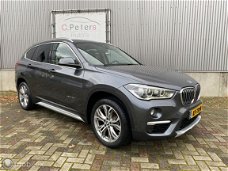 BMW X1 - 1.6d sDrive Centennial High Executive Sport 2016 / Leer / Xenon / Head-up / Keyless / Came