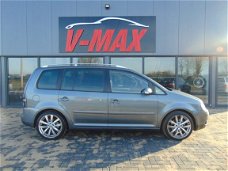 Volkswagen Touran - 2.0 16V FSi Highline LED Clima Cruise Dvd