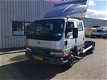 Mitsubishi Canter - B.E Trekker F.E.649 Dub Cab 143 pk geremd 7020 kg - 1 - Thumbnail