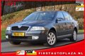 Skoda Octavia - 2.0 TDI Elegance AIRCO/NAVI/CRUISE - 1 - Thumbnail