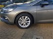 Opel Astra Sports Tourer - 1.0 Innovation | ECC | Navi | PDC | Electr. achterklep - 1 - Thumbnail