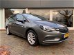 Opel Astra Sports Tourer - AUTOMAAT 1.0 t 105 pk Online Editon navigatie parkeer sensor - 1 - Thumbnail