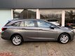 Opel Astra Sports Tourer - AUTOMAAT 1.0 t 105 pk Online Editon navigatie parkeer sensor - 1 - Thumbnail