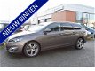 Peugeot 308 SW - 1.2 e-THP Première | Panorama dak | Trekhaak | 6 maanden Bovag garantie - 1 - Thumbnail