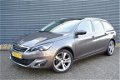 Peugeot 308 SW - 1.2 e-THP Première | Panorama dak | Trekhaak | 6 maanden Bovag garantie - 1 - Thumbnail