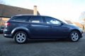 Ford Mondeo Wagon - 2.0 TDCi Ghia | Navigatie | Xenon | Climatronic | PDC | NAP | - 1 - Thumbnail