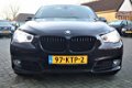 BMW 5-serie Gran Turismo - 535i High Executive | Black Edition | 21 inch | Panorama | Xenon | Trekha - 1 - Thumbnail