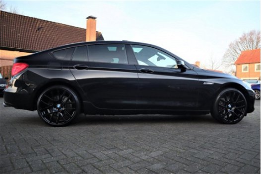 BMW 5-serie Gran Turismo - 535i High Executive | Black Edition | 21 inch | Panorama | Xenon | Trekha - 1