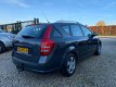 Kia Cee'd Sporty Wagon - 1.4 X-tra ISG *Airco-Leer - 1 - Thumbnail