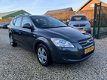 Kia Cee'd Sporty Wagon - 1.4 X-tra ISG *Airco-Leer - 1 - Thumbnail